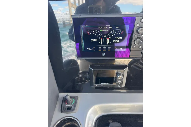  Yacht Photos Pics Dashboard of 2019 Statement 380 Open boat with digital gauges and audio system.
