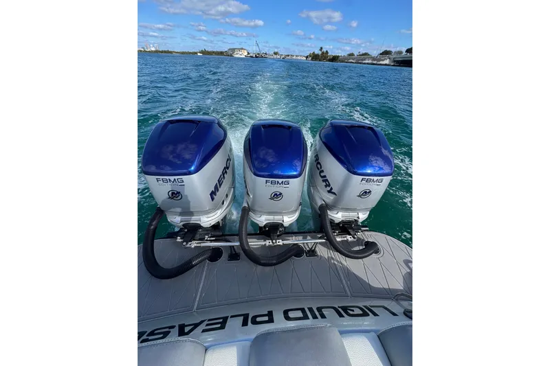  Yacht Photos Pics Triple Mercury outboard engines on 2019 Statement 380 Open boat in open water.