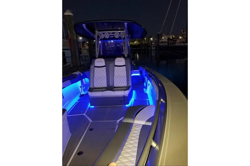  Yacht Photos Pics 2019 Statement 380 Open boat with blue LED lighting at night.