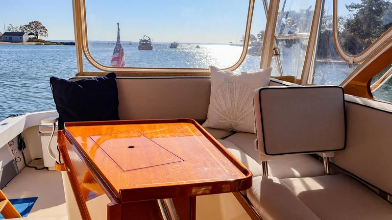 4804mm Yacht Photos Pics Cozy seating area on a 2008 Fortier 33 boat with ocean view.