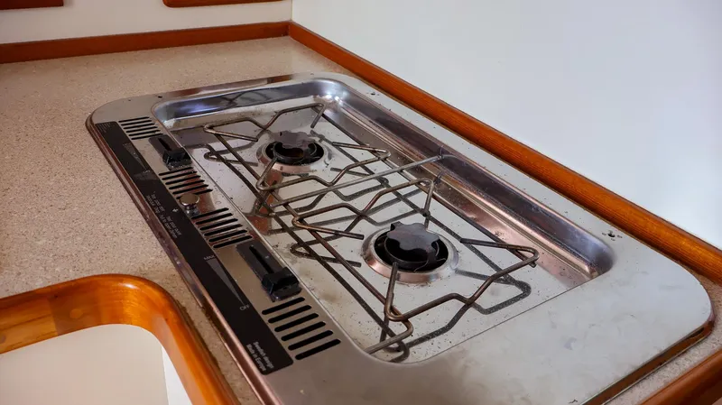 4804mm Yacht Photos Pics Two-burner stove on a 2008 Fortier 33 boat kitchen counter.