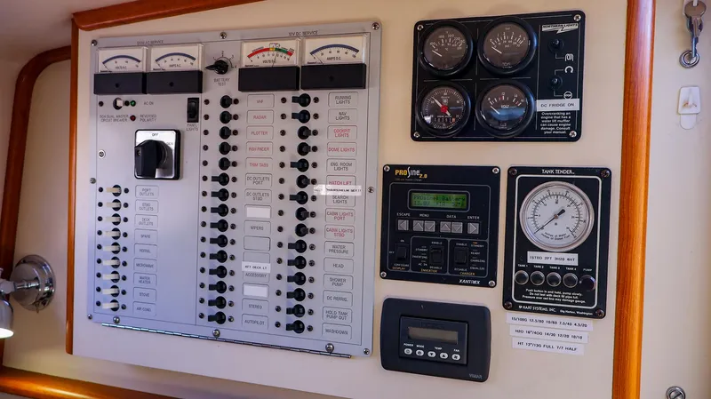 4804mm Yacht Photos Pics Control panel of a 2008 Fortier 33 boat with gauges and switches.