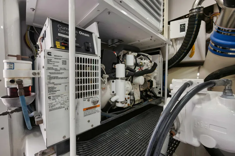 Cookie Monster Yacht Photos Pics Engine room of 2017 Viking Sky Bridge yacht with Cummins Onan generator.