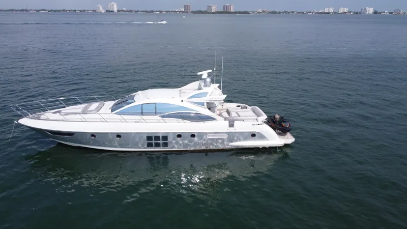 Life Is Great Yacht Photos Pics 2007 Azimut 62S yacht cruising on open water.