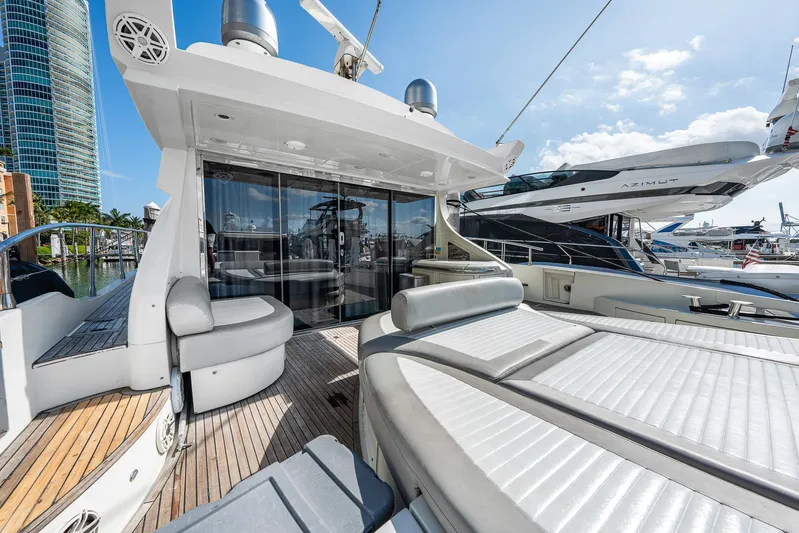 Life Is Great Yacht Photos Pics Luxury 2007 Azimut 62S yacht with spacious deck and modern design in marina setting.