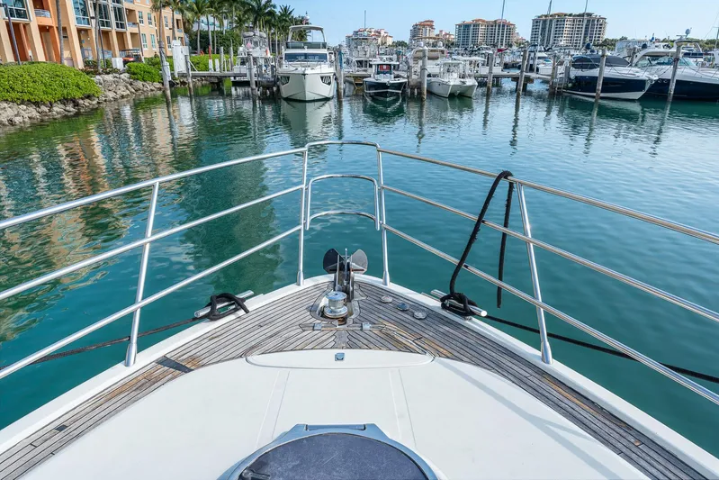 Life Is Great Yacht Photos Pics Bow view of 2007 Azimut 62S yacht docked in a marina.