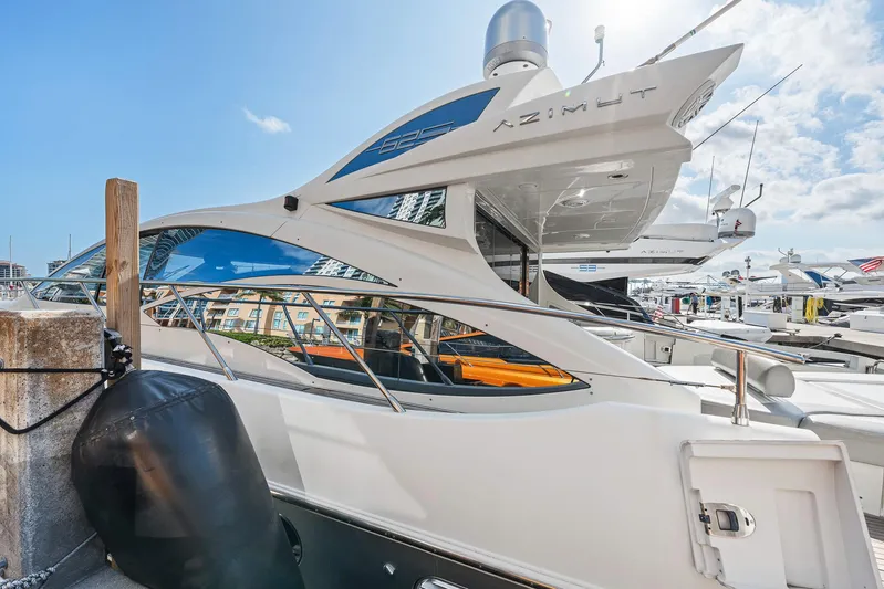 Life Is Great Yacht Photos Pics 2007 Azimut 62S yacht docked at marina, showcasing sleek design and modern features.