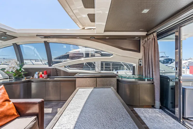 Life Is Great Yacht Photos Pics Luxurious interior of 2007 Azimut 62S yacht with modern design and panoramic windows.