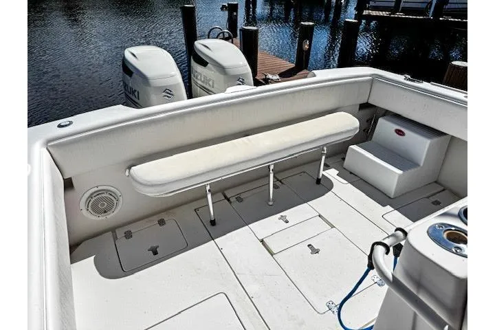  Yacht Photos Pics 1999 Intrepid 356 boat interior with seating and storage compartments.