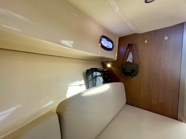 Strike Zone Yacht Photos Pics Interior cabin of 2018 Boston Whaler 315 Conquest with seating and storage.