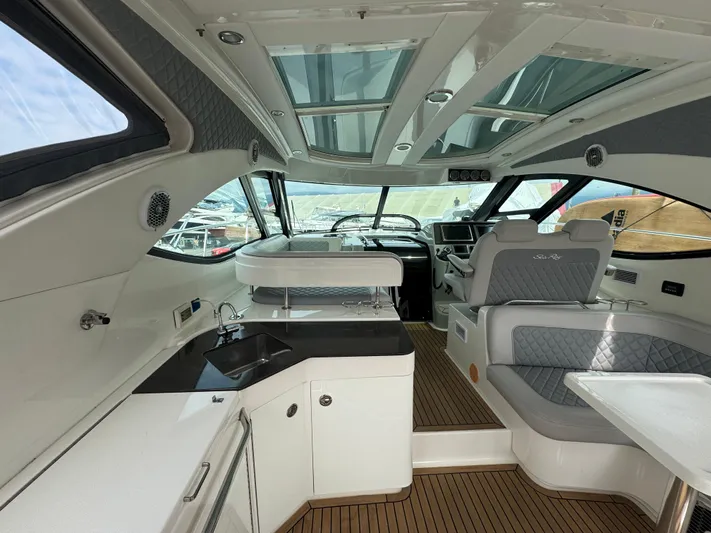  Yacht Photos Pics Interior of 2013 Sea Ray 470 Sundancer yacht with modern design and luxurious seating.