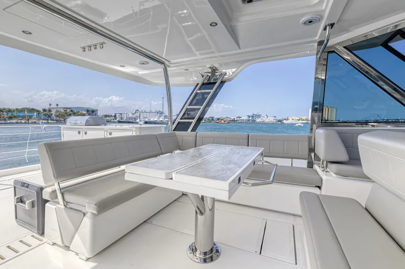  Yacht Photos Pics Luxurious seating area on 2023 Aquila 54 Yacht with ocean view.