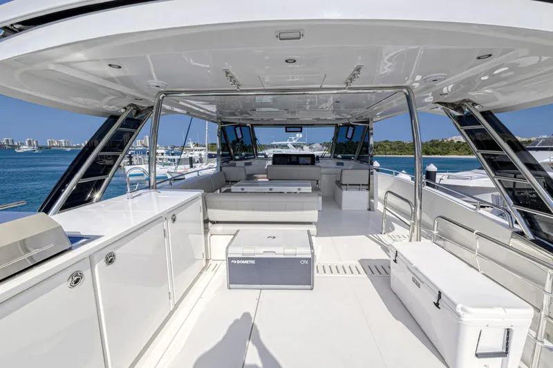  Yacht Photos Pics Luxurious 2023 Aquila 54 Yacht interior with spacious deck and modern amenities.