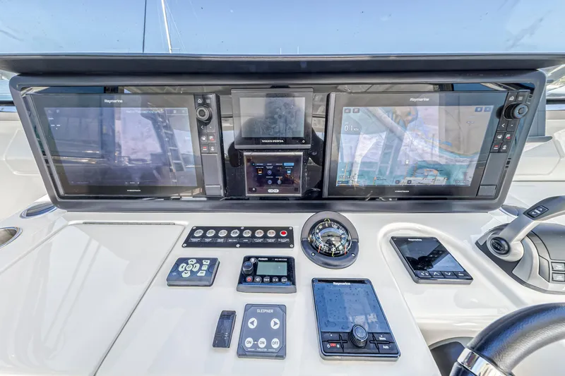  Yacht Photos Pics Helm of 2023 Aquila 54 Yacht with advanced navigation and control systems.