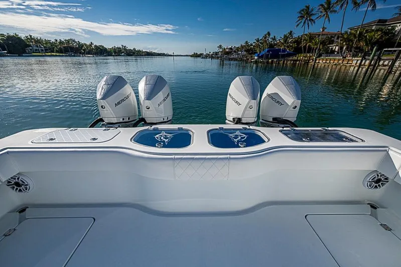  Yacht Photos Pics Freeman 47 boat with Mercury engines on a serene waterway, 2023 model.