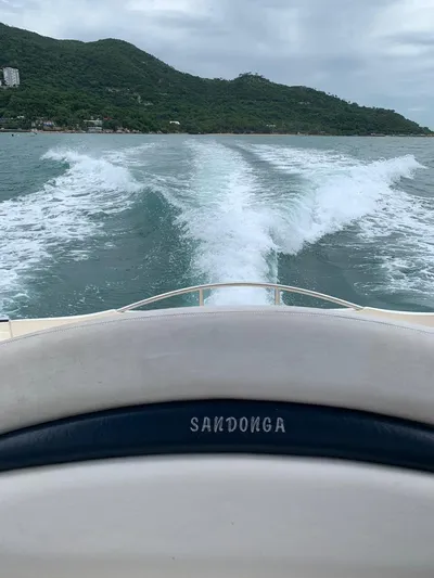  Yacht Photos Pics 1999 Sunseeker Superhawk 34 cruising on the water, view from the cockpit.
