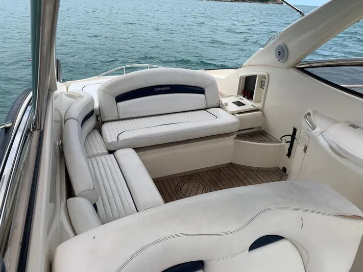  Yacht Photos Pics 1999 Sunseeker Superhawk 34 yacht interior with white leather seating.