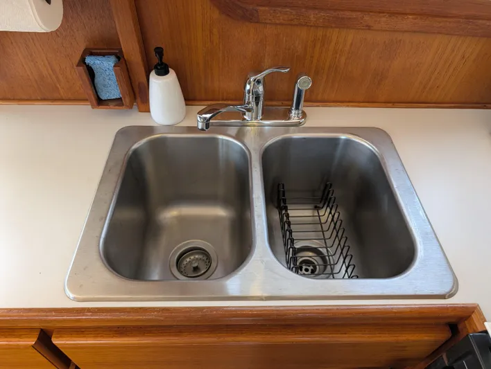 Monarch Yacht Photos Pics Stainless steel double sink with faucet in a 1997 Monk 36 boat kitchen.