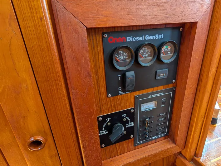 Monarch Yacht Photos Pics Control panel of a 1997 Monk 36 boat with Onan Diesel GenSet gauges.