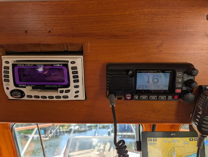 Monarch Yacht Photos Pics Boat dashboard with radio and navigation equipment, Monk 36, 1997 model.