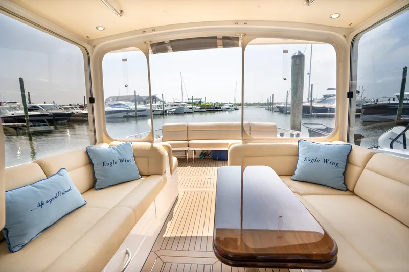 Eagle Wing Yacht Photos Pics Luxurious interior of 2017 MJM 40z Downeast yacht with marina view.