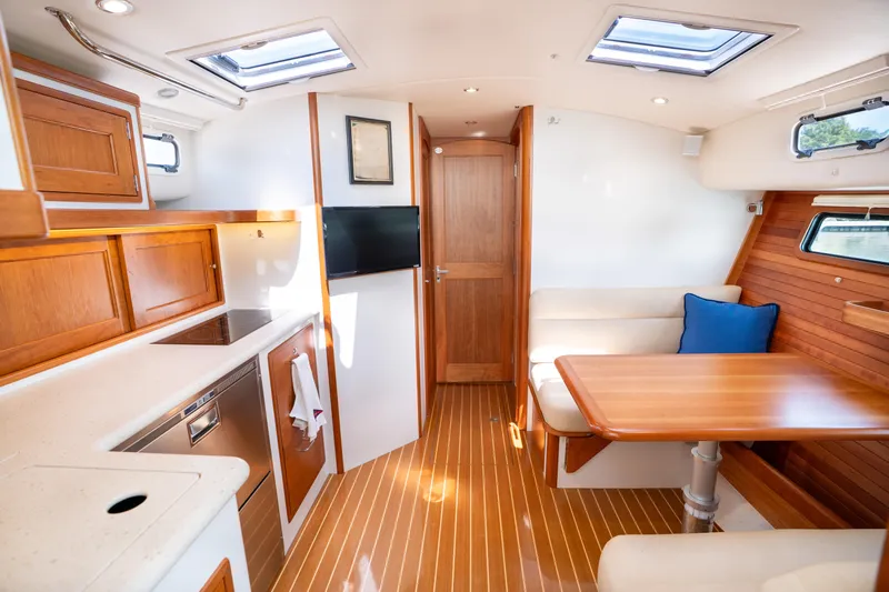 Eagle Wing Yacht Photos Pics Interior of 2017 MJM 40z Downeast yacht with wood finishes and modern amenities.