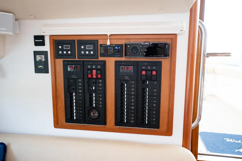 Eagle Wing Yacht Photos Pics Control panel of 2017 MJM 40z Downeast boat, featuring digital displays and switches.