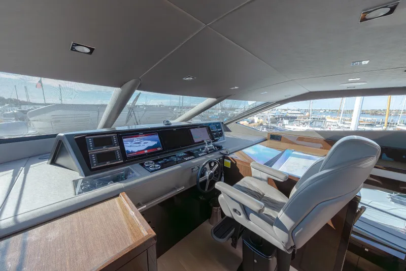 Reunion Yacht Photos Pics Luxurious helm of 2019 Sunseeker 95 Yacht with advanced navigation systems.