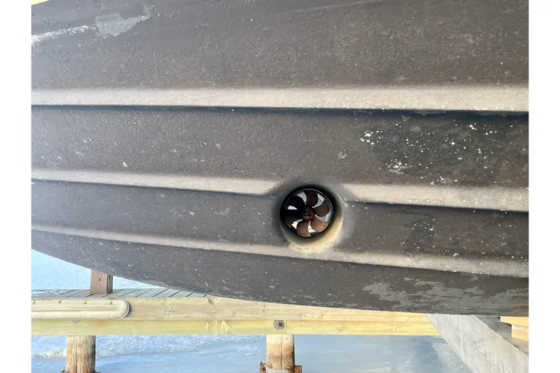  Yacht Photos Pics Bottom view of a 1999 Sea Ray Sundancer 460 boat hull with visible propeller.