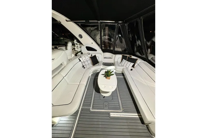  Yacht Photos Pics Luxurious interior of 1999 Sea Ray Sundancer 460 yacht with elegant seating and decor.