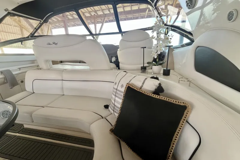 Yacht Photos Pics Luxurious interior of a 1999 Sea Ray Sundancer 460 yacht with elegant seating and decor.