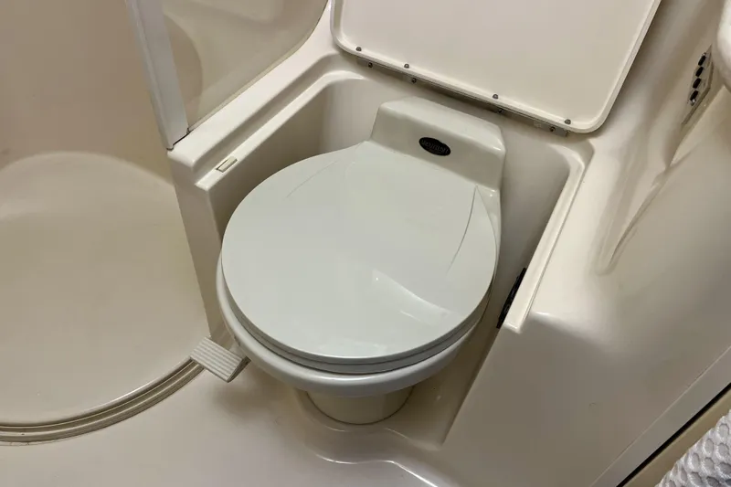  Yacht Photos Pics Marine toilet in 1999 Sea Ray Sundancer 460 yacht bathroom.