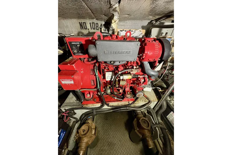  Yacht Photos Pics Engine room of 1999 Sea Ray Sundancer 460 with Westerbeke generator.