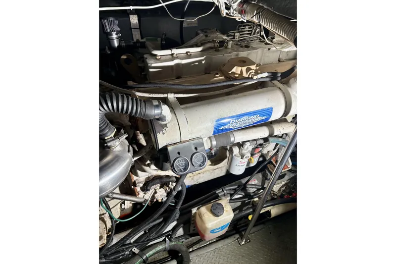  Yacht Photos Pics Engine compartment of 1999 Sea Ray Sundancer 460 with Diamond Performance components.