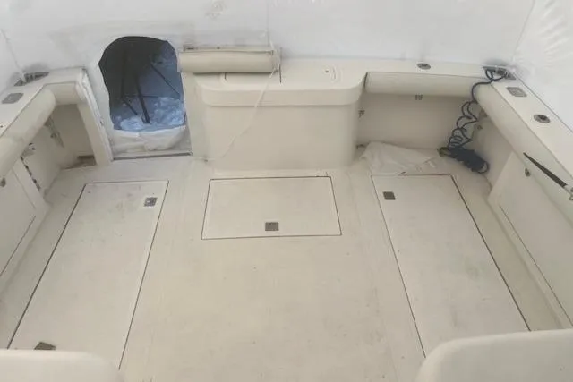 Miss Madison Yacht Photos Pics 2003 Cabo 35 Express boat interior with spacious deck and storage compartments.