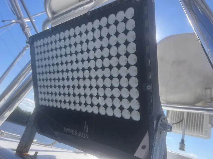 Miss Madison Yacht Photos Pics LED light panel on a 2003 Cabo Express boat under clear blue sky.