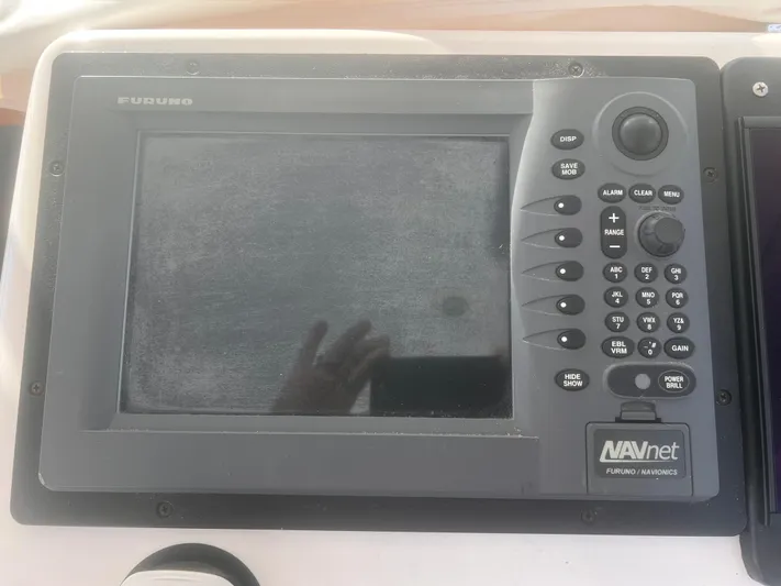 Miss Madison Yacht Photos Pics Furuno NAVnet marine display on 2003 Cabo Express boat dashboard.