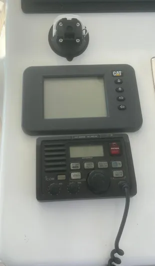 Miss Madison Yacht Photos Pics Boat control panel with radio and display, Cabo Express 2003 model.