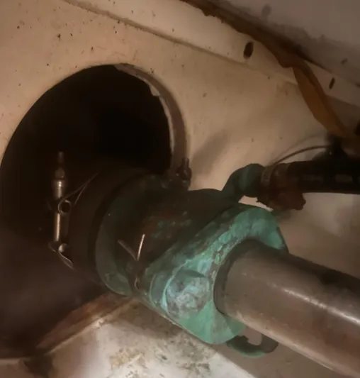 Miss Madison Yacht Photos Pics Close-up of a 2003 Cabo Express boat's shaft and coupling mechanism.