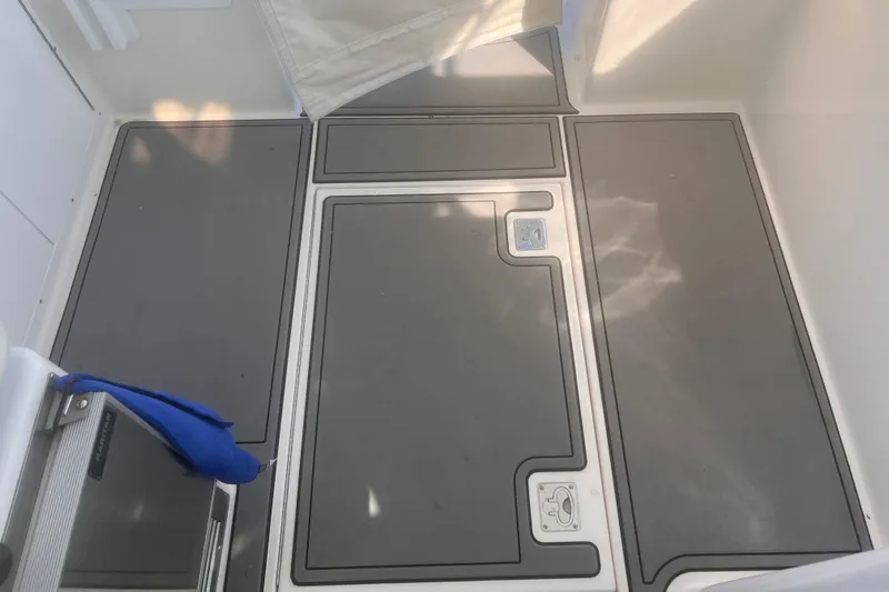 Miss Madison Yacht Photos Pics 2003 Cabo Express boat deck with gray non-slip flooring.