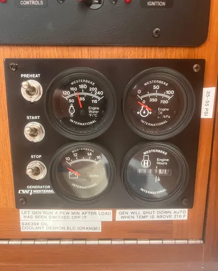 Miss Madison Yacht Photos Pics Control panel of a 2003 Cabo Express boat with engine gauges and switches.