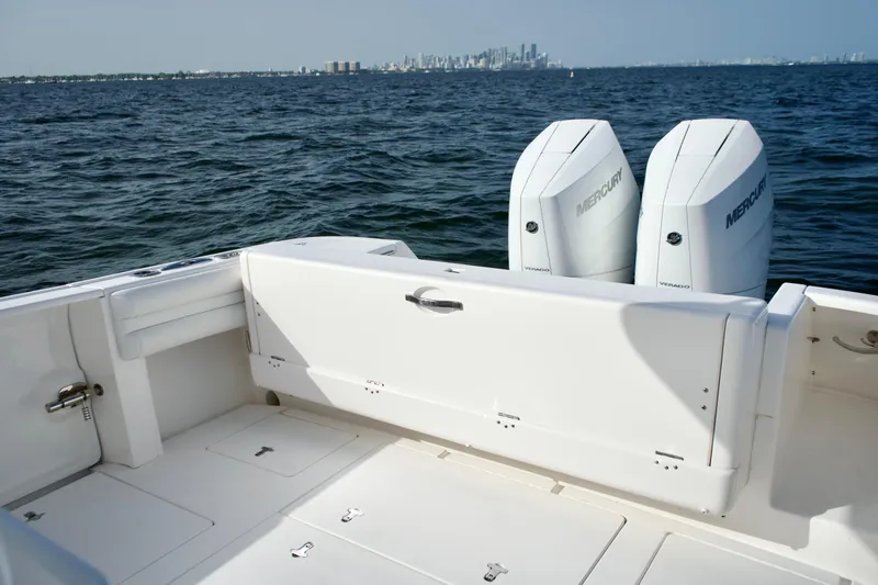 V10 400's Yacht Photos Pics 2015 Intrepid 375 Center Console boat with twin Mercury engines on open water.