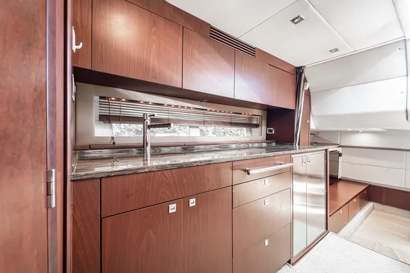 Atm Yacht Photos Pics Luxurious 2013 Sea Ray 45 yacht interior with modern kitchen cabinetry and sleek design.