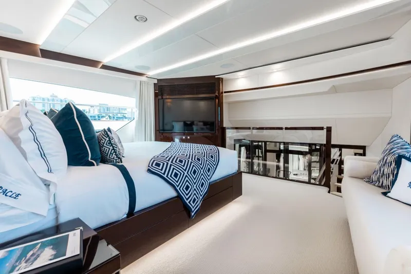 Mirracle Yacht Photos Pics Luxurious interior of 2018 Sunseeker 95 Yacht with elegant bedding and modern design.