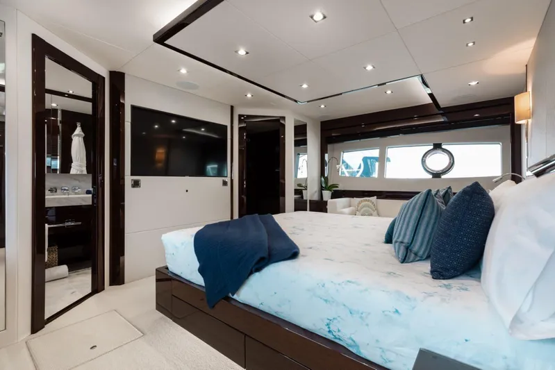 Mirracle Yacht Photos Pics Luxurious interior of 2018 Sunseeker 95 Yacht with elegant bedroom and modern amenities.