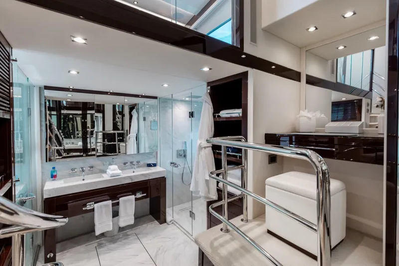 Mirracle Yacht Photos Pics Luxurious bathroom interior of 2018 Sunseeker 95 Yacht, featuring modern fixtures and elegant design.