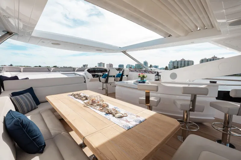 Mirracle Yacht Photos Pics Luxurious 2018 Sunseeker 95 Yacht interior with elegant seating and dining area.