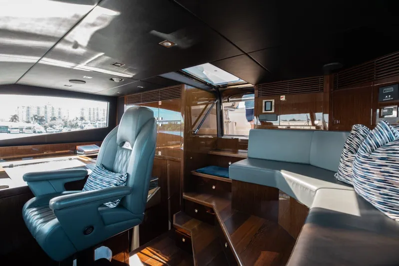 Mirracle Yacht Photos Pics Luxurious interior of 2018 Sunseeker 95 Yacht with plush seating and modern design.