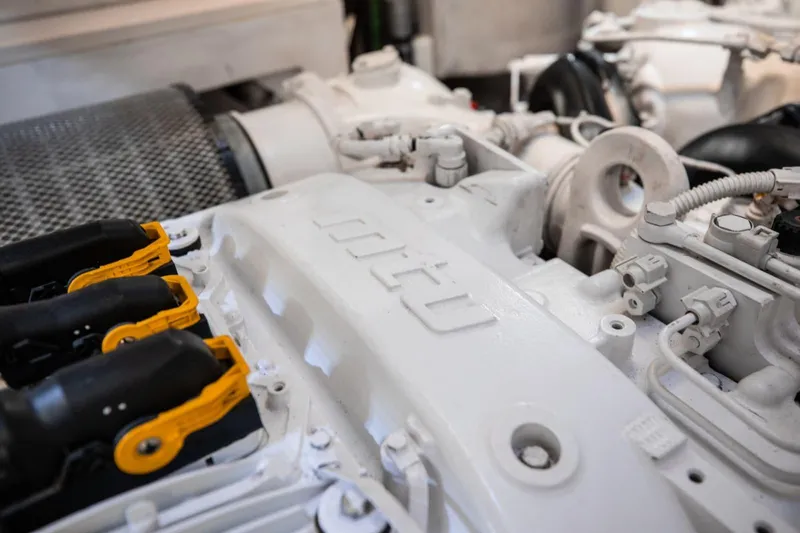 Mirracle Yacht Photos Pics Engine room of a 2018 Sunseeker 95 Yacht, showcasing detailed mechanical components.