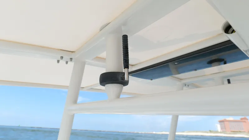 Extremely Clean / Fish Ready Yacht Photos Pics 2004 Jupiter 31 FS boat detail with ocean backdrop.